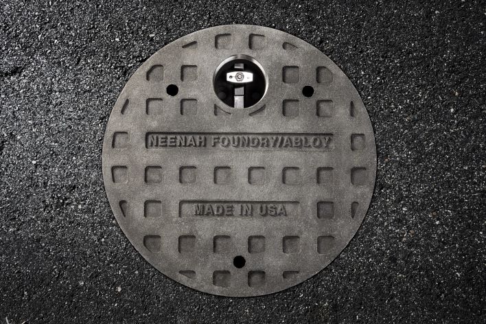 Neenah Foundry Ablov Made in USA manhole cover showing InfraLOCK