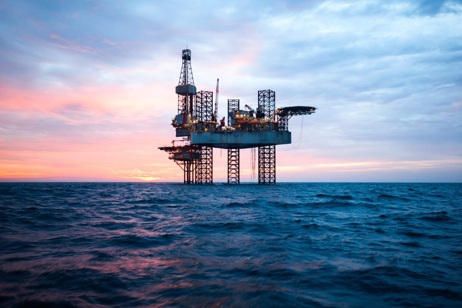 Offshore rig with sunset in background